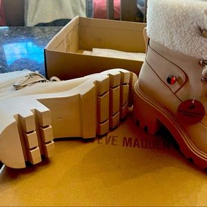 Brand new beautiful, water resistant Steve Madden boots.